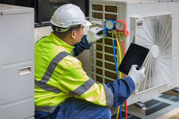 Professional Hvac technician working in Hebron, IL